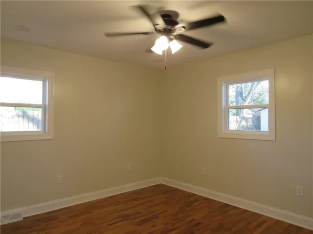 a bathroom with a sink a toilet and bathtub