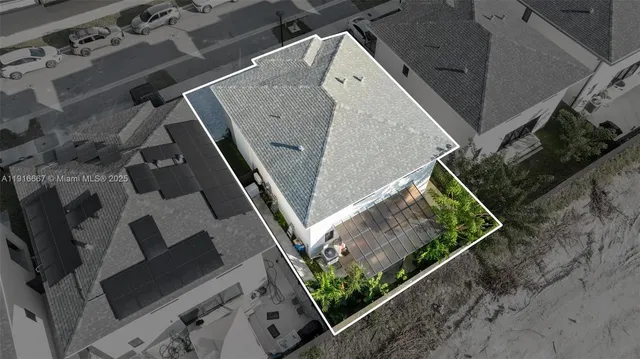 an aerial view of a house with roof