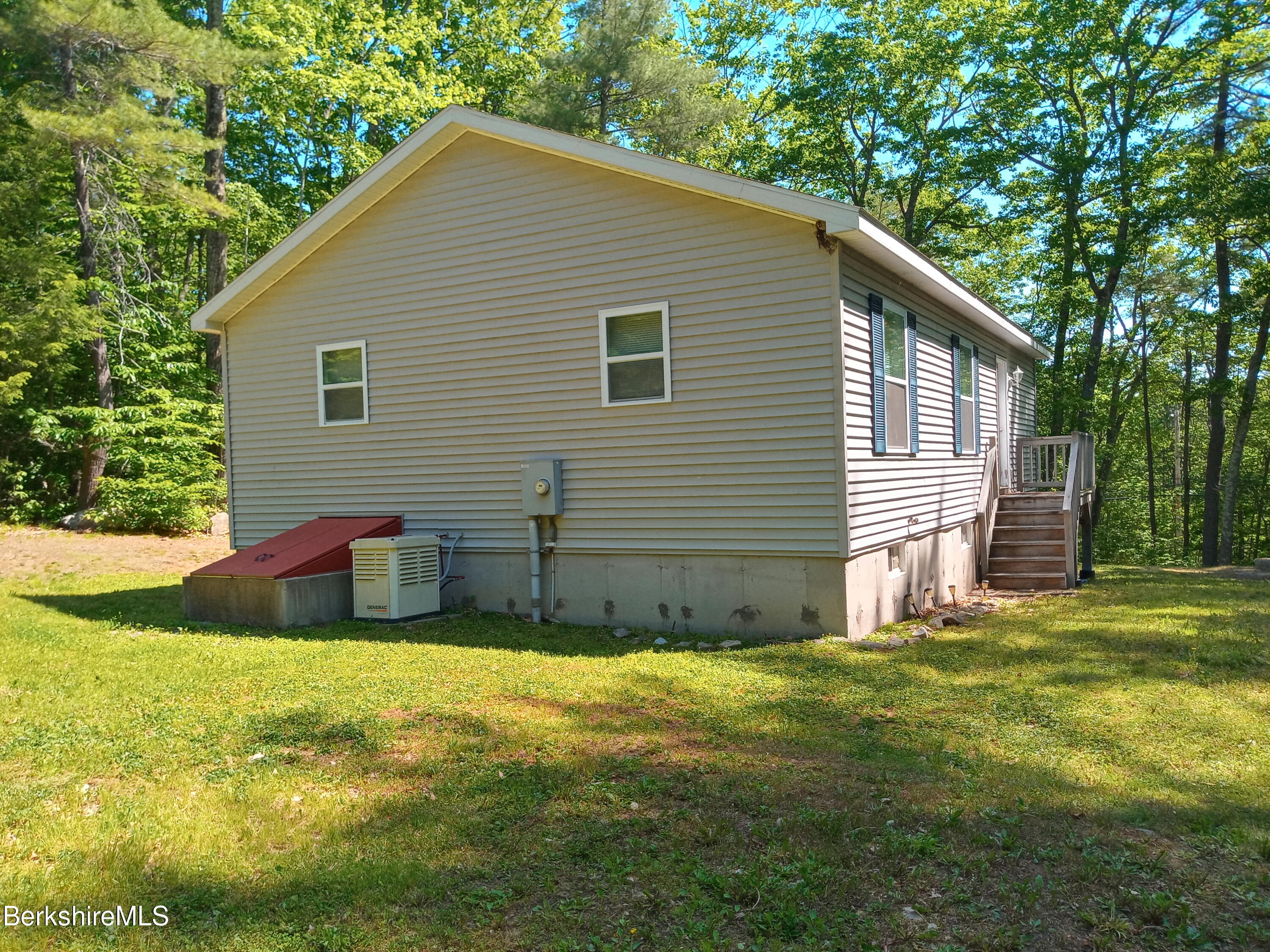42 Norton Road Otis, MA 01029 - Photo 2 of 35 a house view with a backyard space