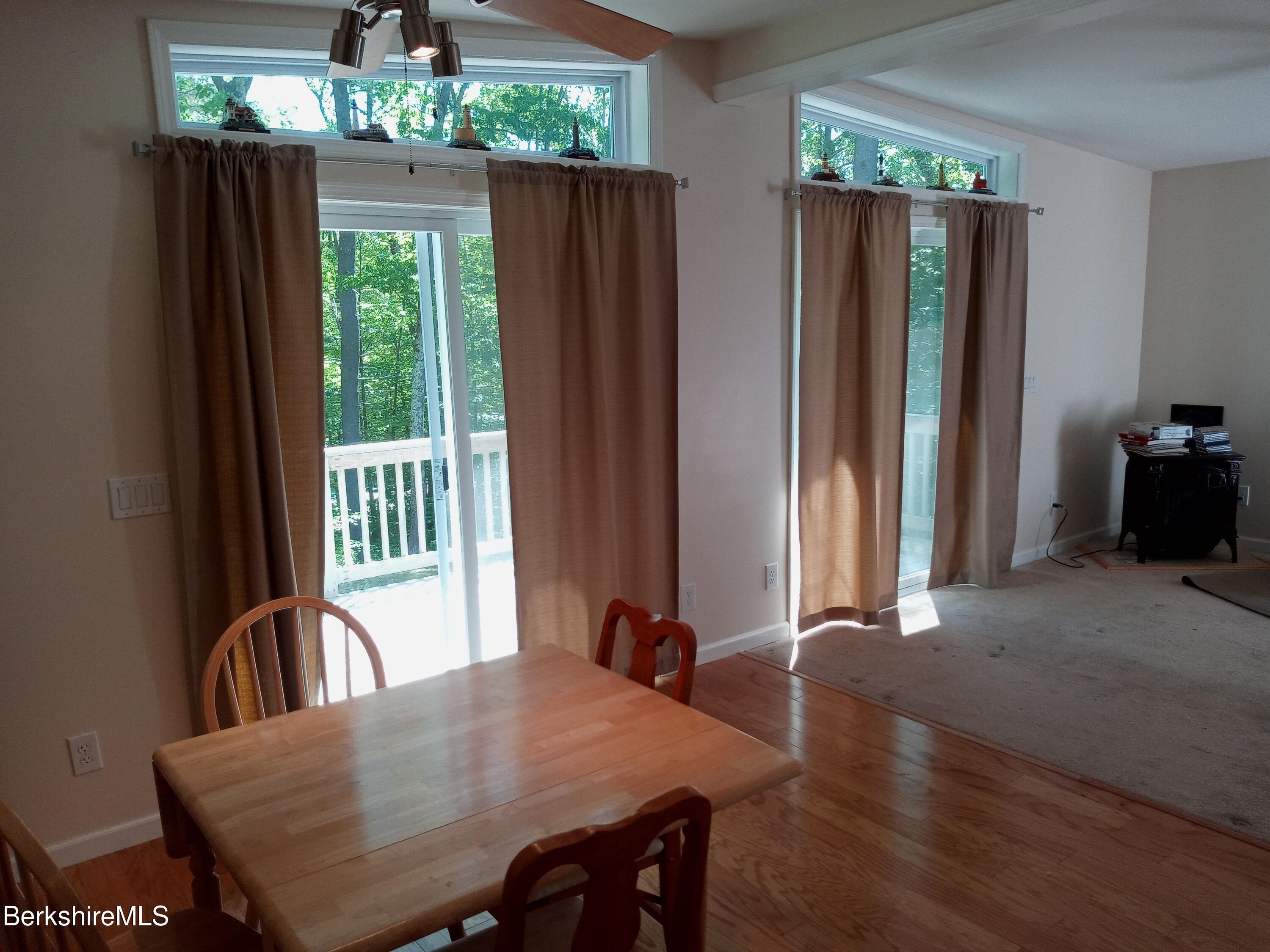 42 Norton Road Otis, MA 01029 - Photo 27 of 35 a view of a dining room with a table and chairs