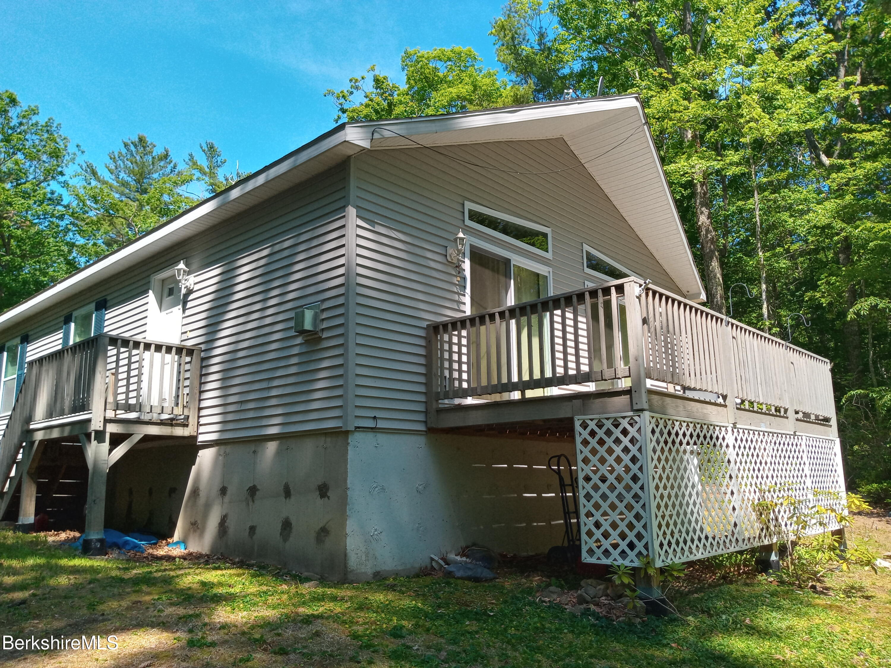 42 Norton Road Otis, MA 01029 - Photo 6 of 35 a view of a house with a yard