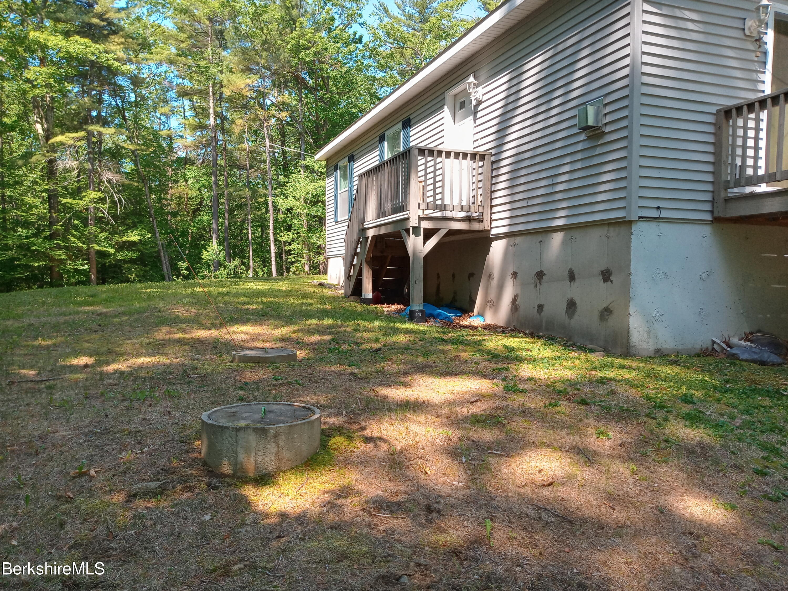 42 Norton Road Otis, MA 01029 - Photo 7 of 35 a view of a house with backyard