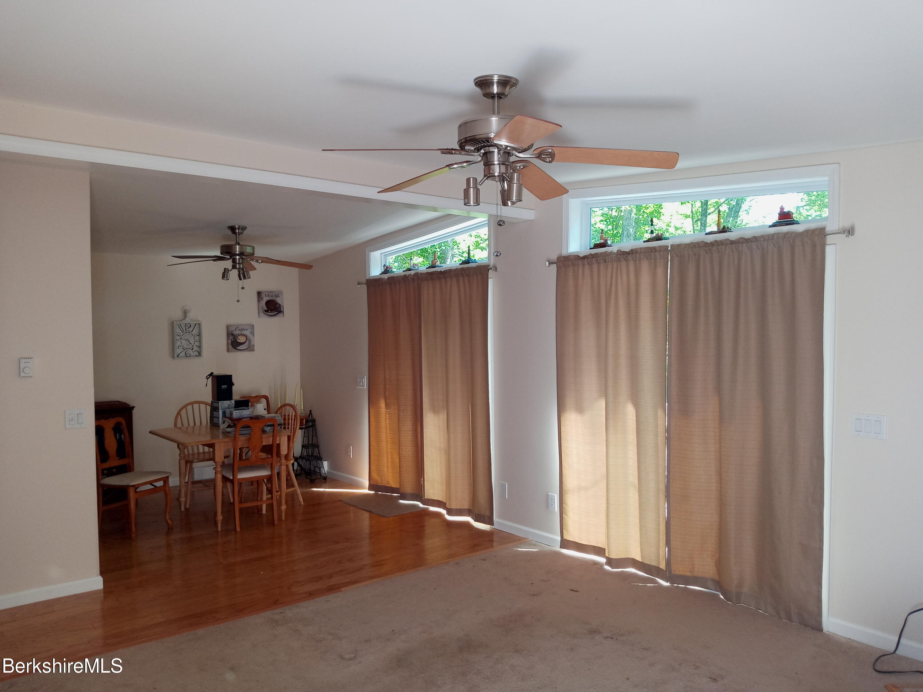 42 Norton Road Otis, MA 01029 - Photo 10 of 35 a view of a dining room with furniture window and wooden floor