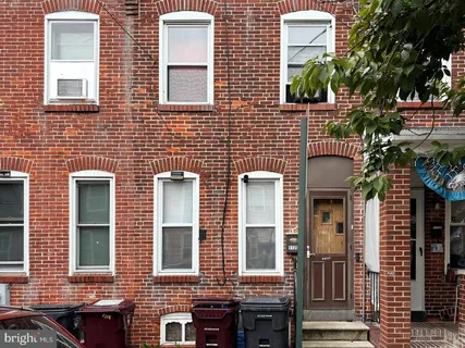 a front view of a house having outdoor space