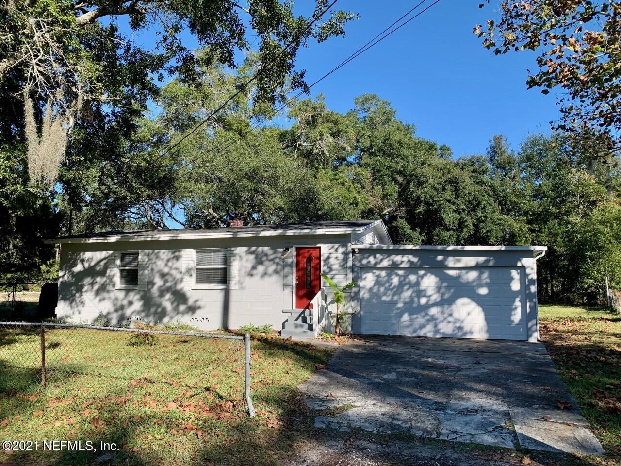 11661 Dewitt Road Jacksonville, FL 32218 - Photo 1 of 14 a view of house with swimming pool