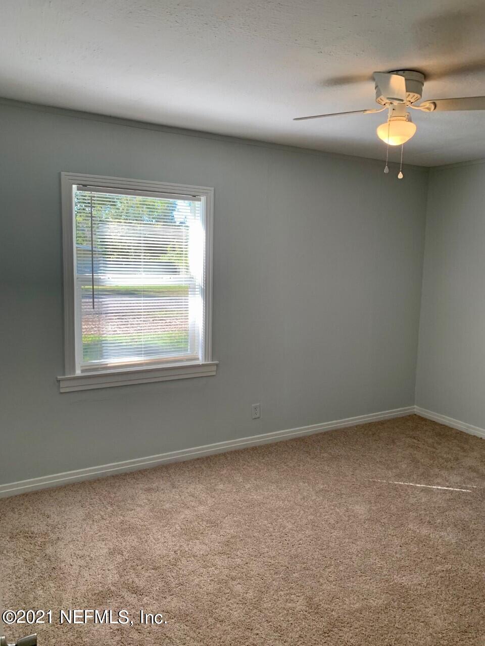 11661 Dewitt Road Jacksonville, FL 32218 - Photo 8 of 14 en empty room with window