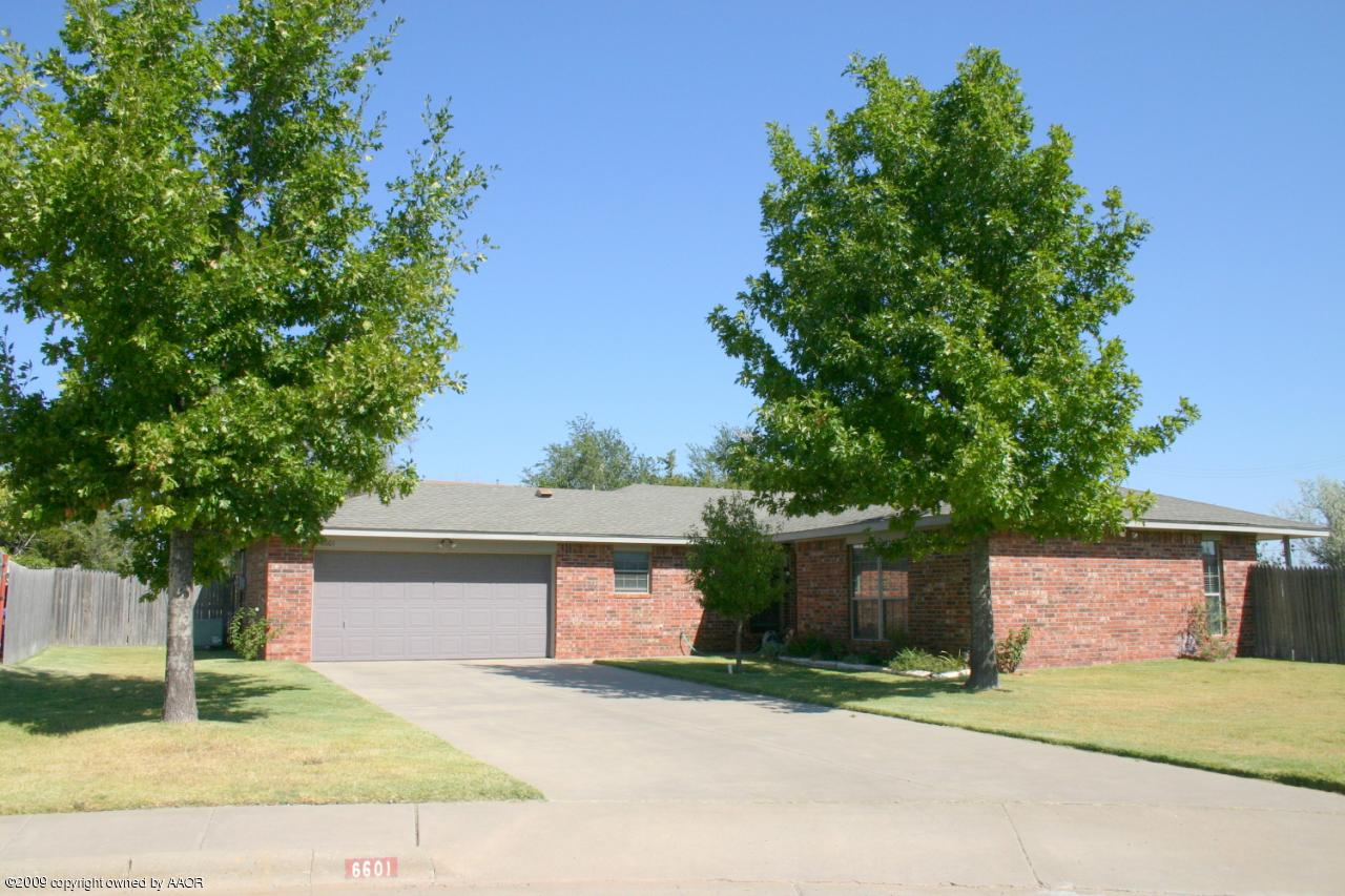 6601 Slater Circle Amarillo, TX 79110 - Photo 1 of 31 front view of a house with a street