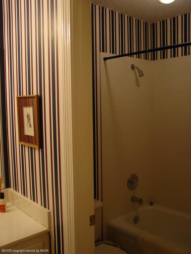 6601 Slater Circle Amarillo, TX 79110 - Photo 24 of 31 a view of a bathroom with a bathtub