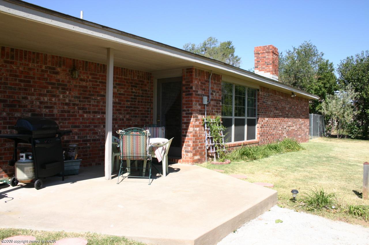 6601 Slater Circle Amarillo, TX 79110 - Photo 25 of 31 a backyard of a house with seating space