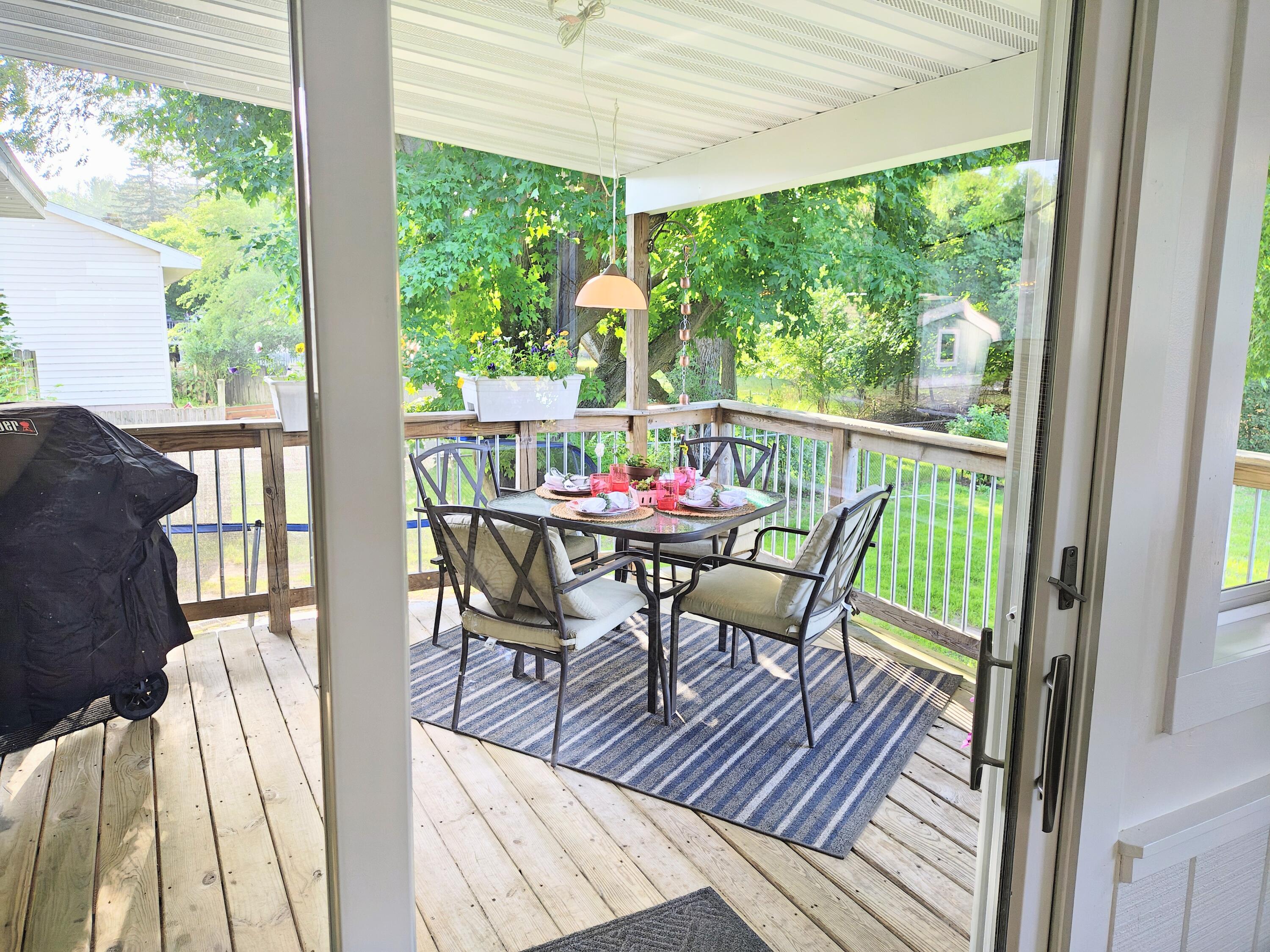 816 Benston Road Whitehall, MI 49461 - Photo 7 of 38 Covered porch