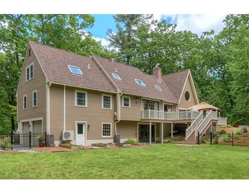 14 Deer Run Road Littleton, MA 01460 - Photo 1 of 41 a front view of a house with a garden