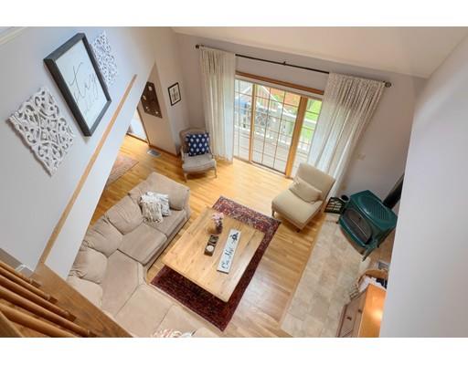 14 Deer Run Road Littleton, MA 01460 - Photo 11 of 41 a living room with furniture and a window