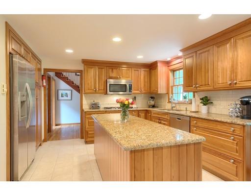 14 Deer Run Road Littleton, MA 01460 - Photo 13 of 41 a kitchen with stainless steel appliances granite countertop a sink refrigerator and cabinets