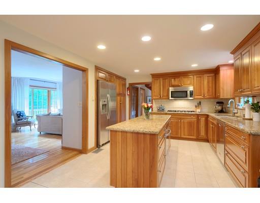 14 Deer Run Road Littleton, MA 01460 - Photo 16 of 41 a kitchen with stainless steel appliances granite countertop a refrigerator a sink dishwasher and a stove with wooden floor