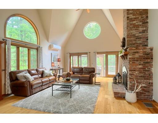 14 Deer Run Road Littleton, MA 01460 - Photo 17 of 41 a living room with furniture and a large window