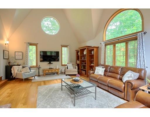 14 Deer Run Road Littleton, MA 01460 - Photo 18 of 41 a living room with furniture and a large window