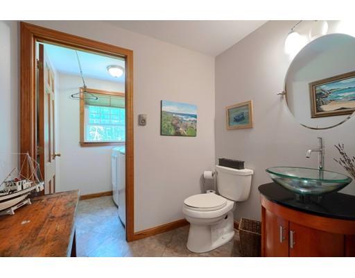 14 Deer Run Road Littleton, MA 01460 - Photo 21 of 41 a bathroom with a toilet a sink and mirror