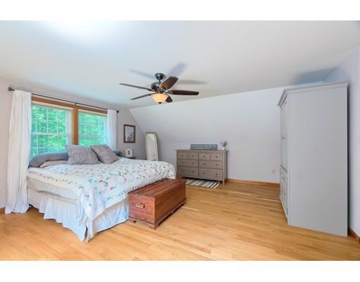 14 Deer Run Road Littleton, MA 01460 - Photo 28 of 41 a living room with furniture and a large window
