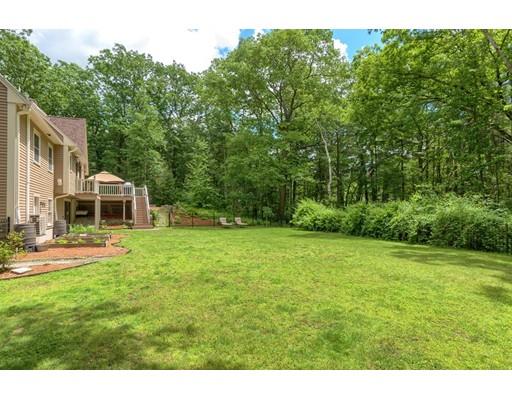 14 Deer Run Road Littleton, MA 01460 - Photo 32 of 41 a view of a house with a backyard