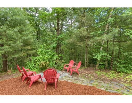 14 Deer Run Road Littleton, MA 01460 - Photo 38 of 41 a view of a backyard with a table and chair