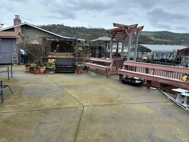 a view of a terrace with sitting area