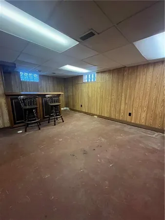 an empty room with a bench