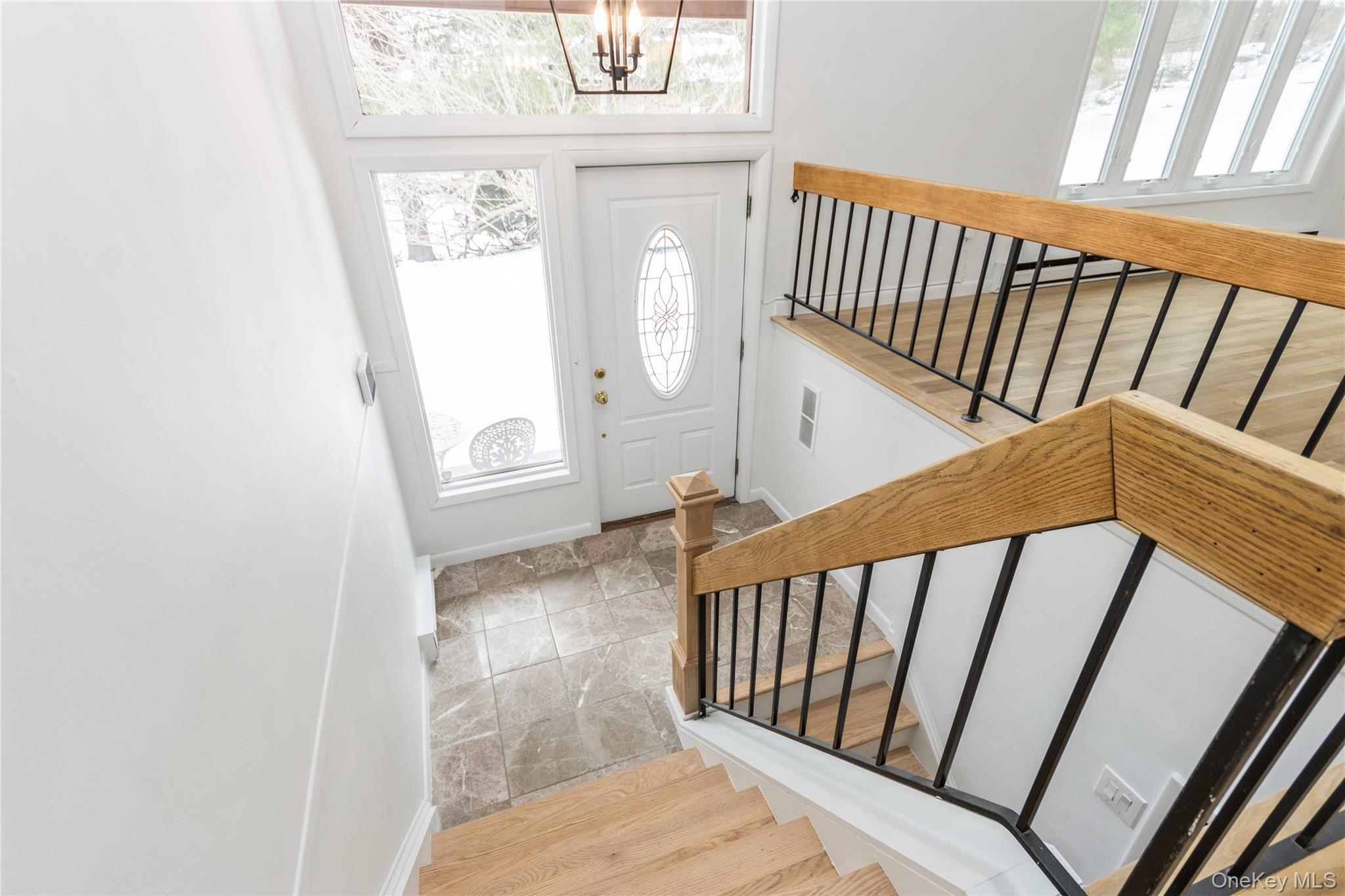 20 Lake Road Mahopac, NY 10541 - Photo 2 of 48 a view of a hallway with wooden floor and staircase