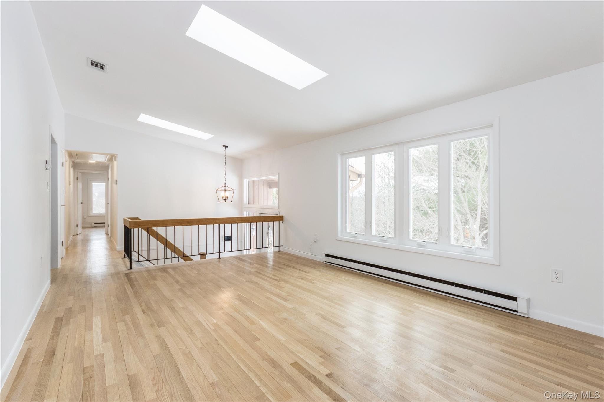 20 Lake Road Mahopac, NY 10541 - Photo 3 of 48 a view of an empty room with wooden floor and a window