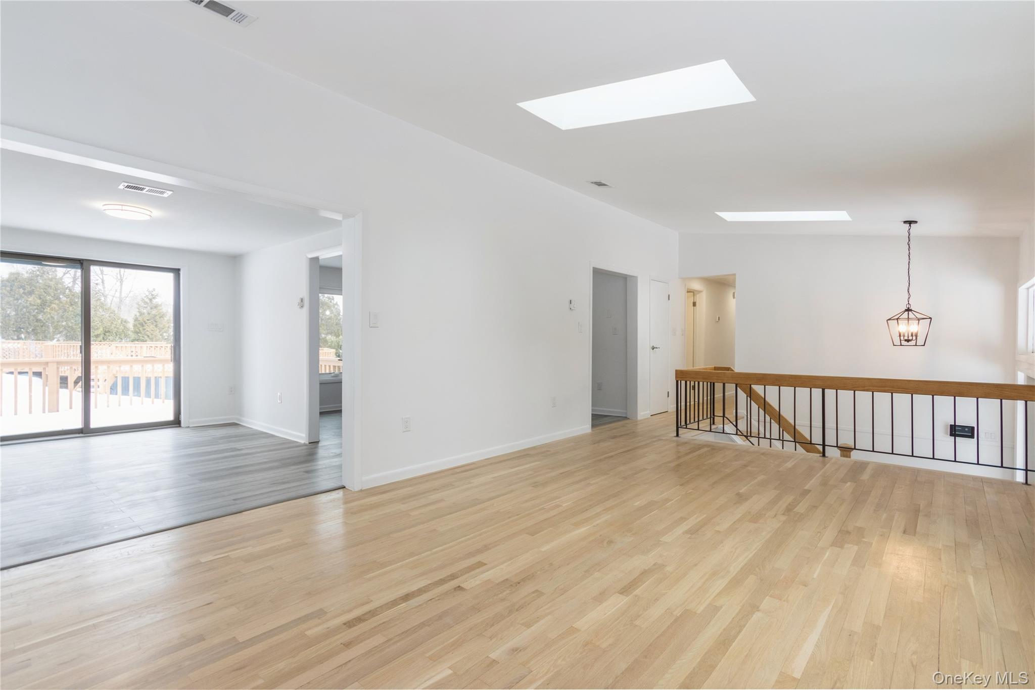 20 Lake Road Mahopac, NY 10541 - Photo 32 of 48 a view of an empty room with wooden floor and windows