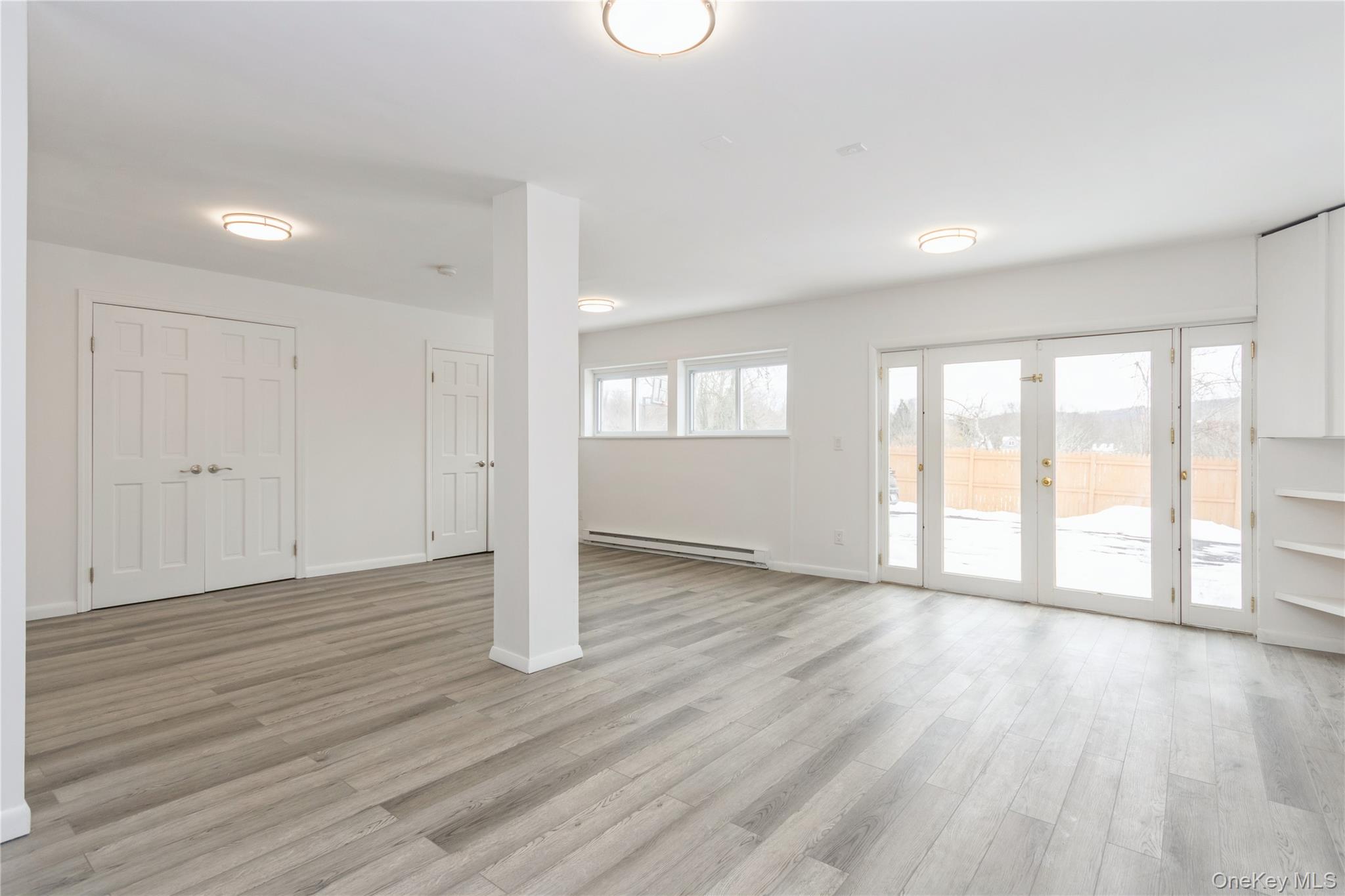 20 Lake Road Mahopac, NY 10541 - Photo 36 of 48 a view of an empty room with wooden floor and a window