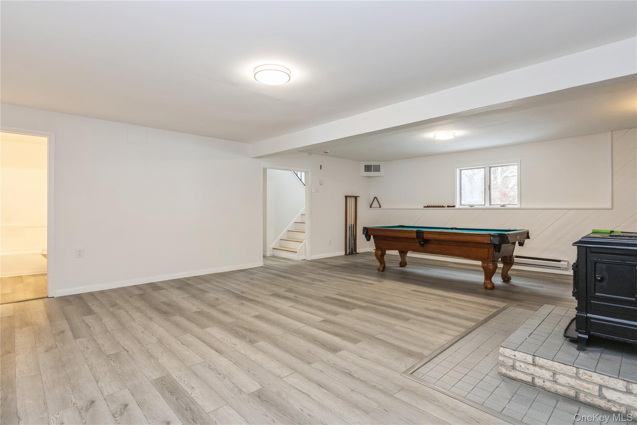 20 Lake Road Mahopac, NY 10541 - Photo 39 of 48 a room with wooden floor and furniture