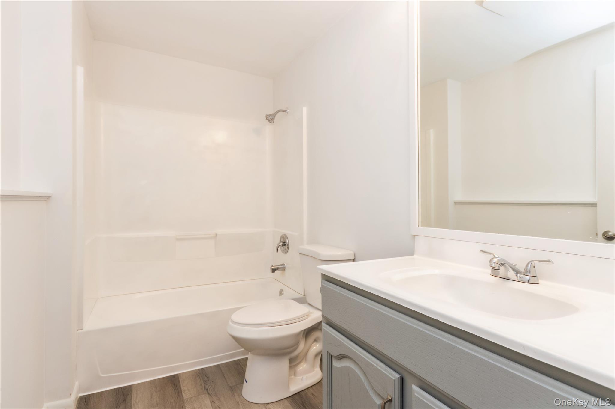 20 Lake Road Mahopac, NY 10541 - Photo 4 of 48 a bathroom with a sink a toilet and shower