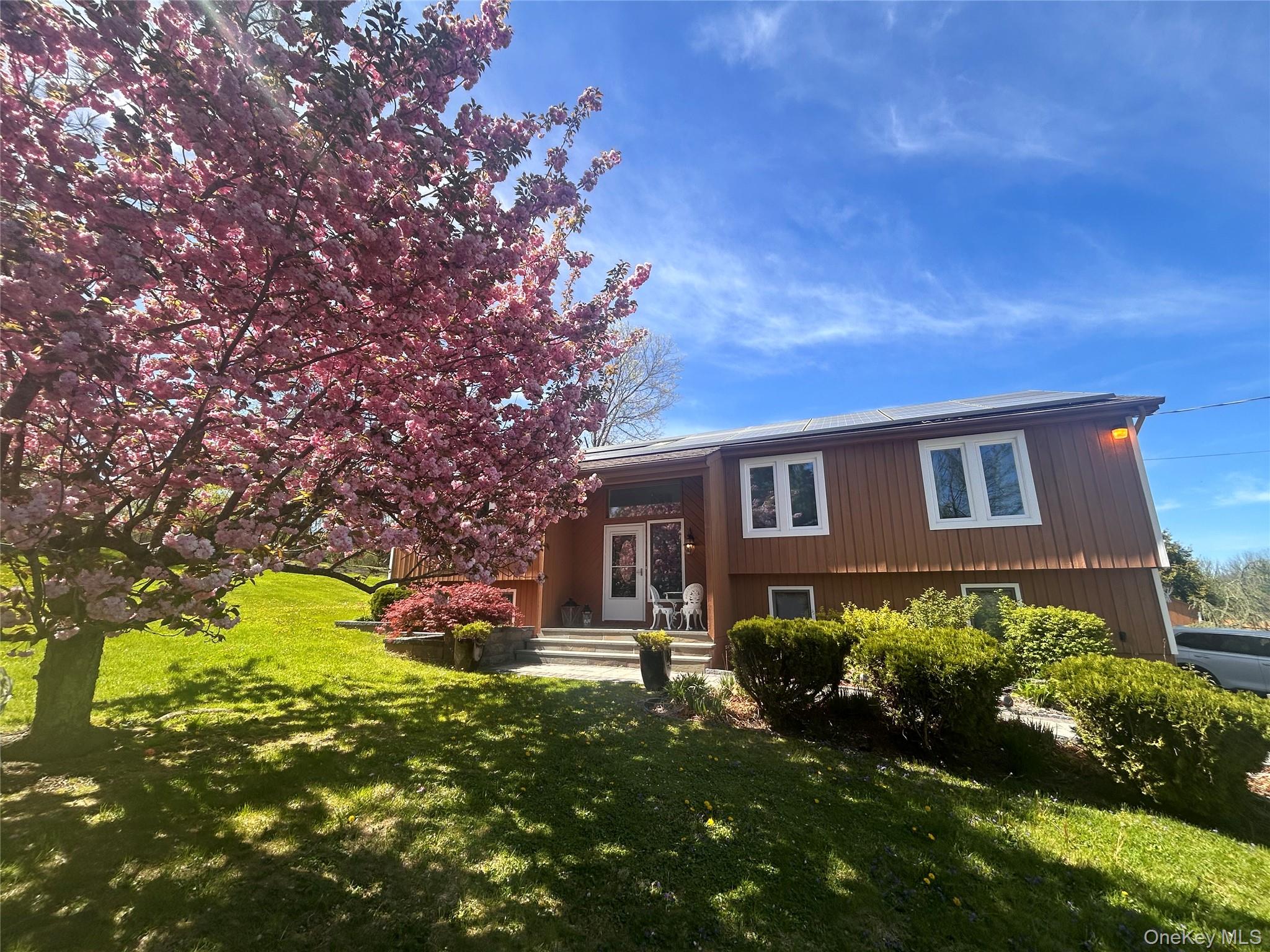 20 Lake Road Mahopac, NY 10541 - Photo 47 of 48 a front view of a house with garden