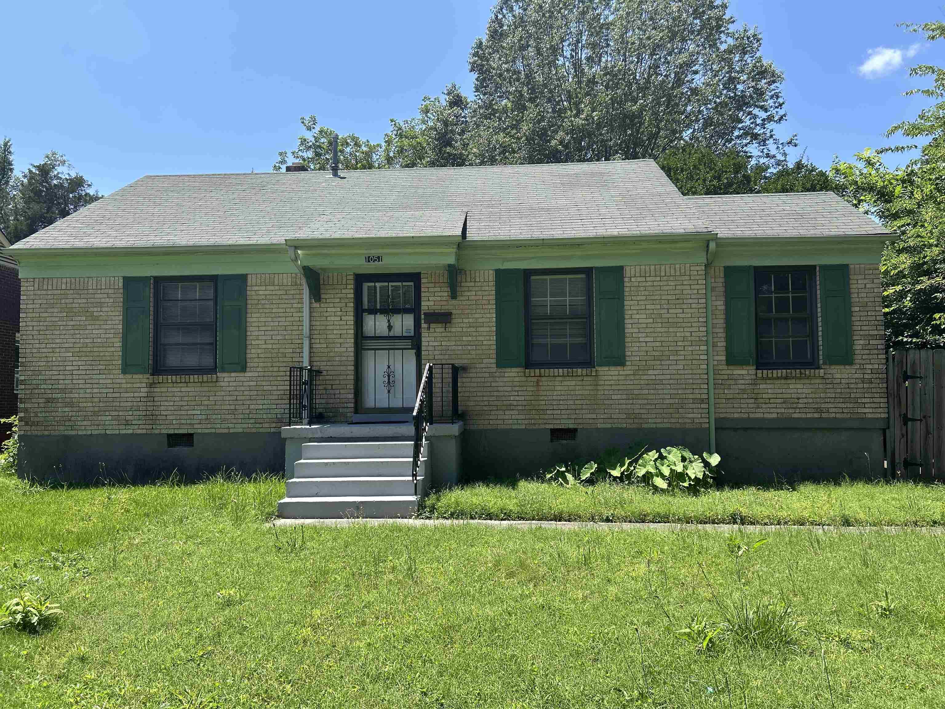 1051 Mt Vernon Road Memphis, TN 38111 - Photo 1 of 7 Ranch-style house featuring crawl space, a front lawn, and brick siding