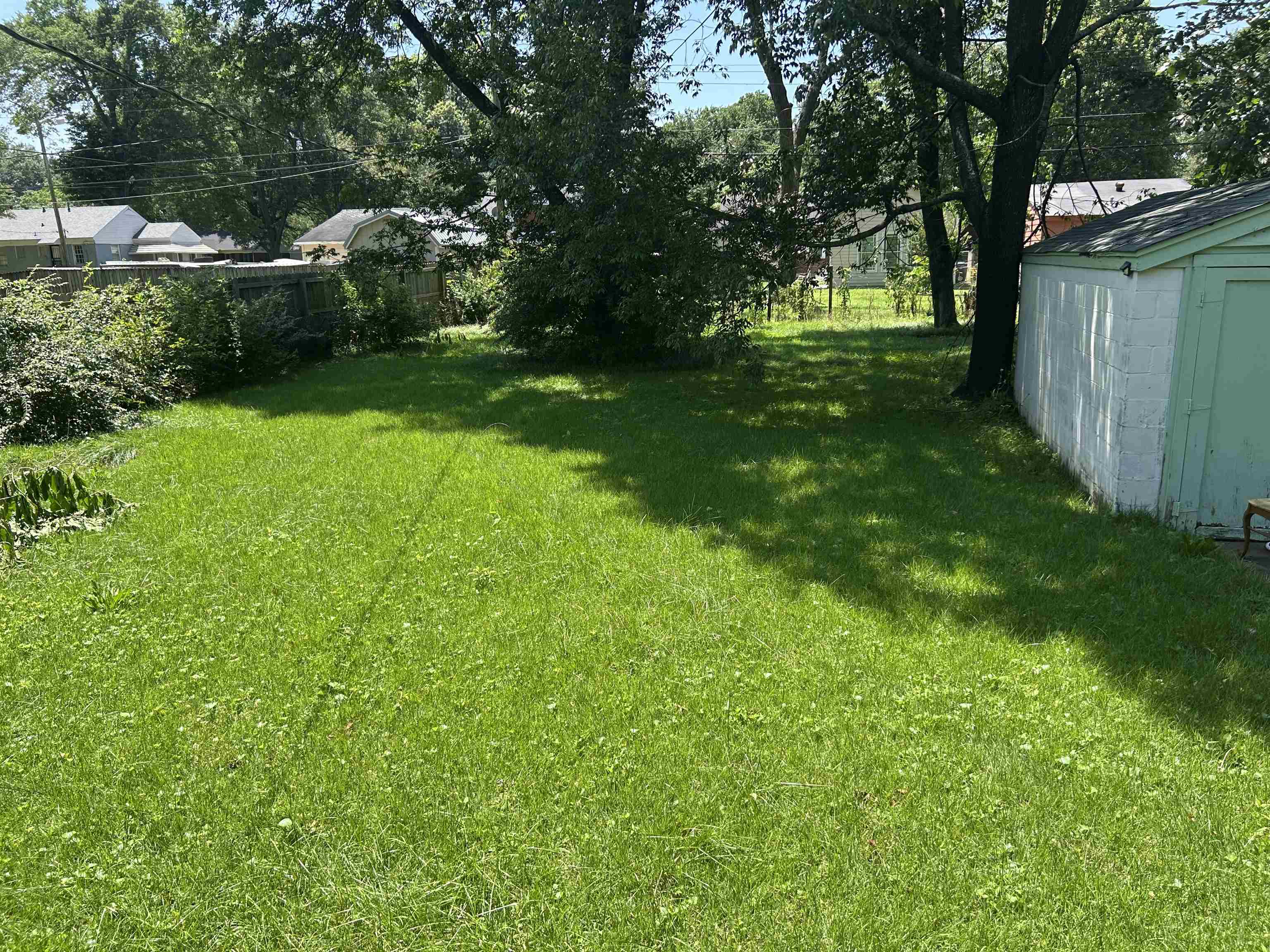 1051 Mt Vernon Road Memphis, TN 38111 - Photo 7 of 7 View of yard with a storage shed