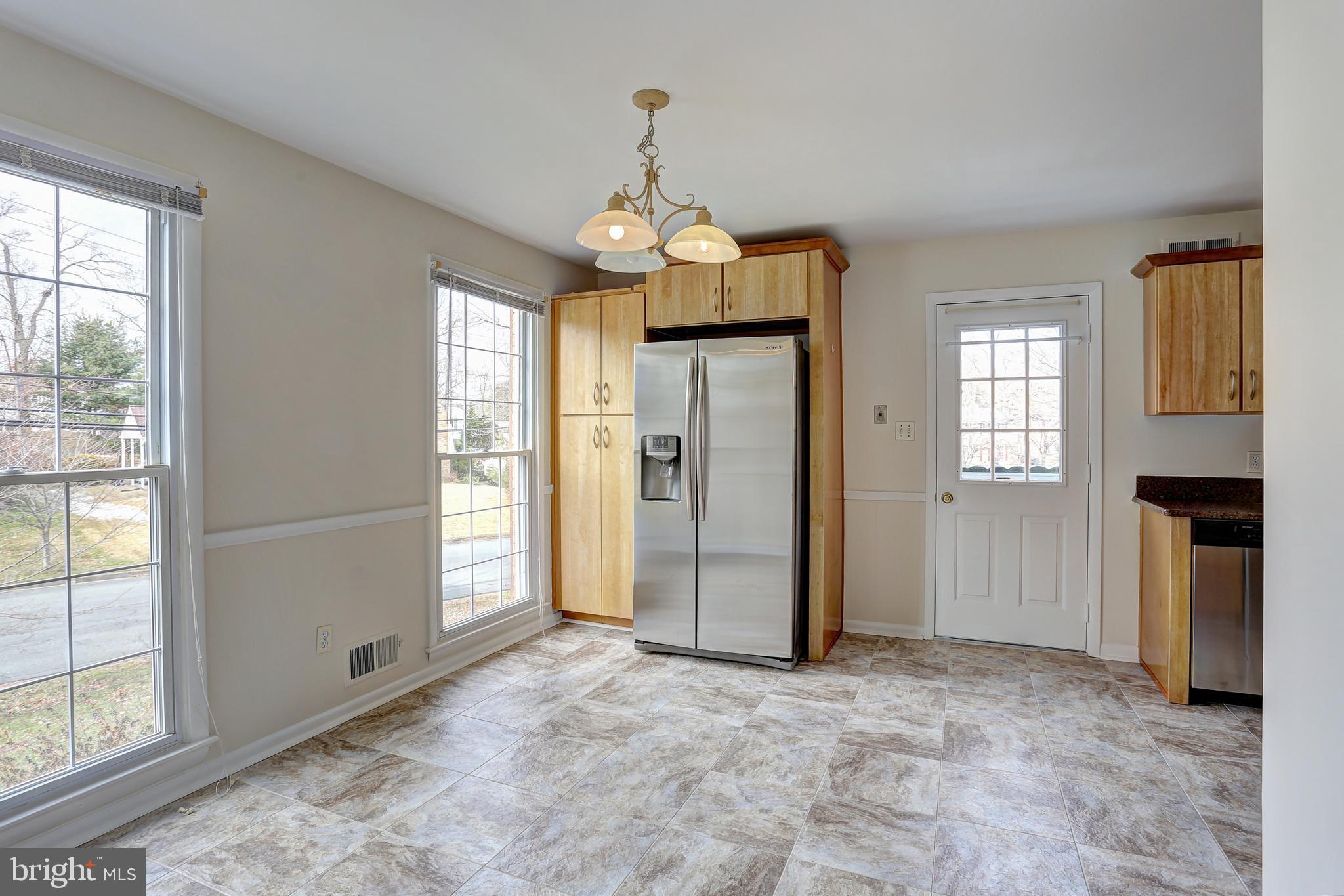 16009 Kent Road Laurel, MD 20707 - Photo 12 of 41 Beautiful updated floor in kitchen w/ big windows