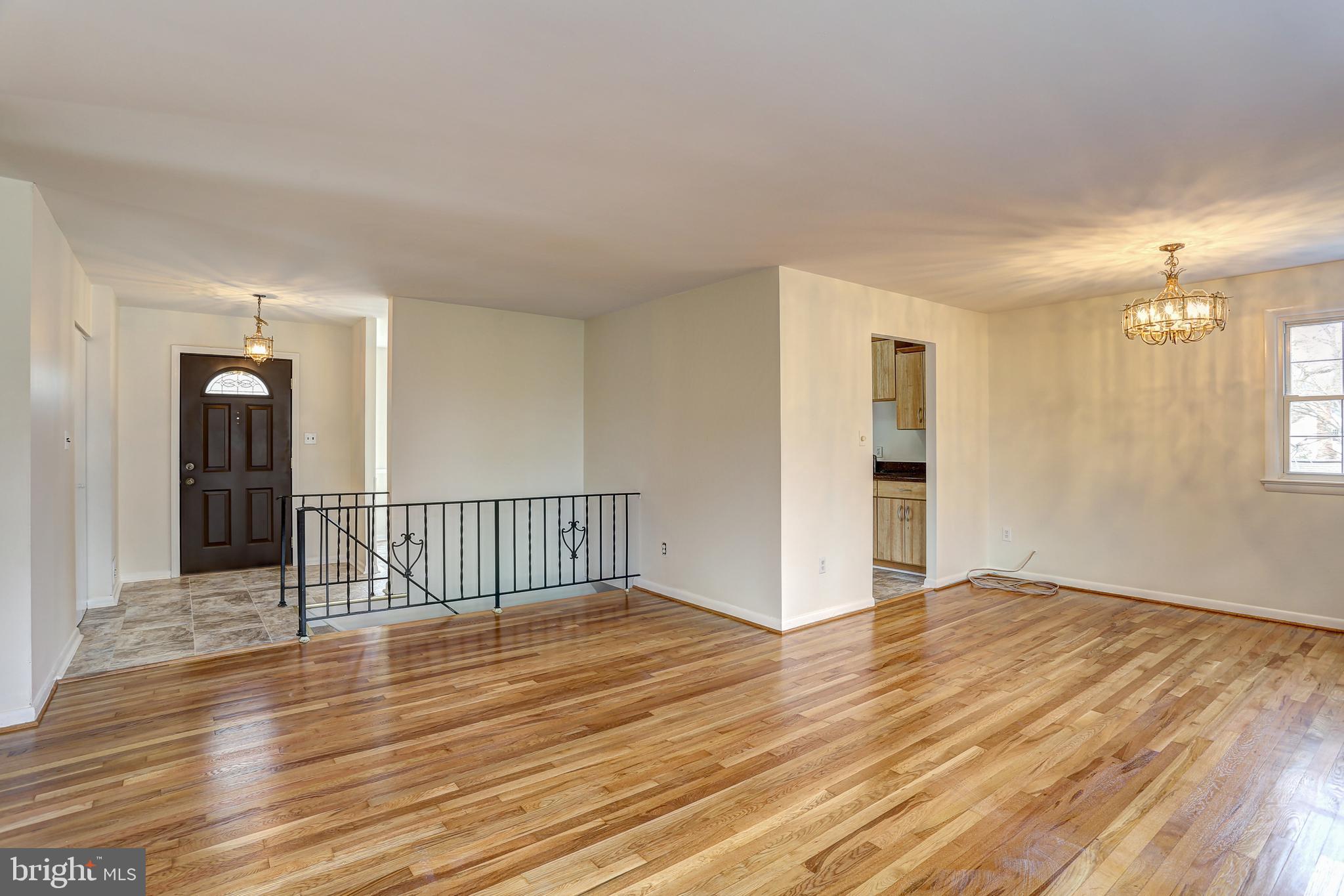 16009 Kent Road Laurel, MD 20707 - Photo 3 of 41 Refinished hardwood floors in HUGE living/dining