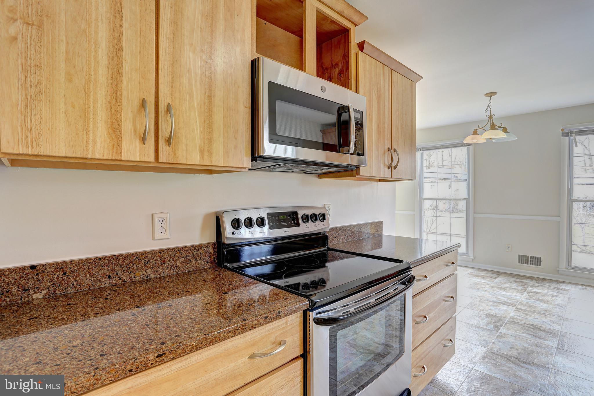 16009 Kent Road Laurel, MD 20707 - Photo 9 of 41 Built-in microwave and upgraded cabinets