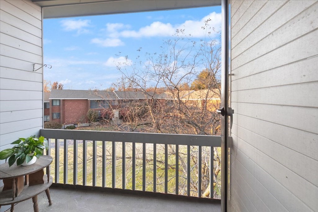 5 Tsienneto Road, Unit 187 Derry, NH 03038 - Photo 20 of 27 a view of a balcony with a yard