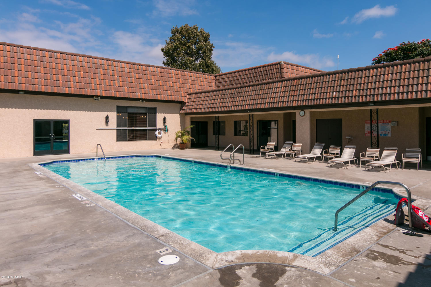470 Raspberry Place, Unit 30 Oxnard, CA 93036 - Photo 16 of 21 a view of a patio with table and chairs potted plants and large tree