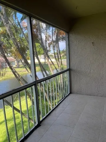 a bathroom with a glass door shower