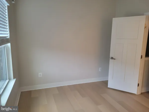 an empty room with a door
