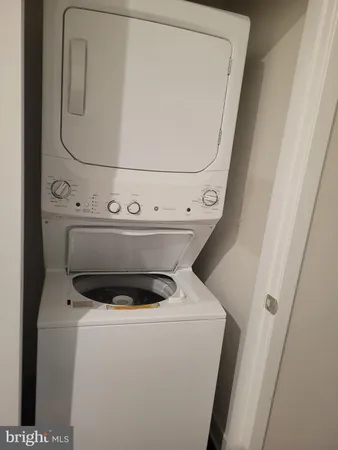 a view of a wooden deck with a yard