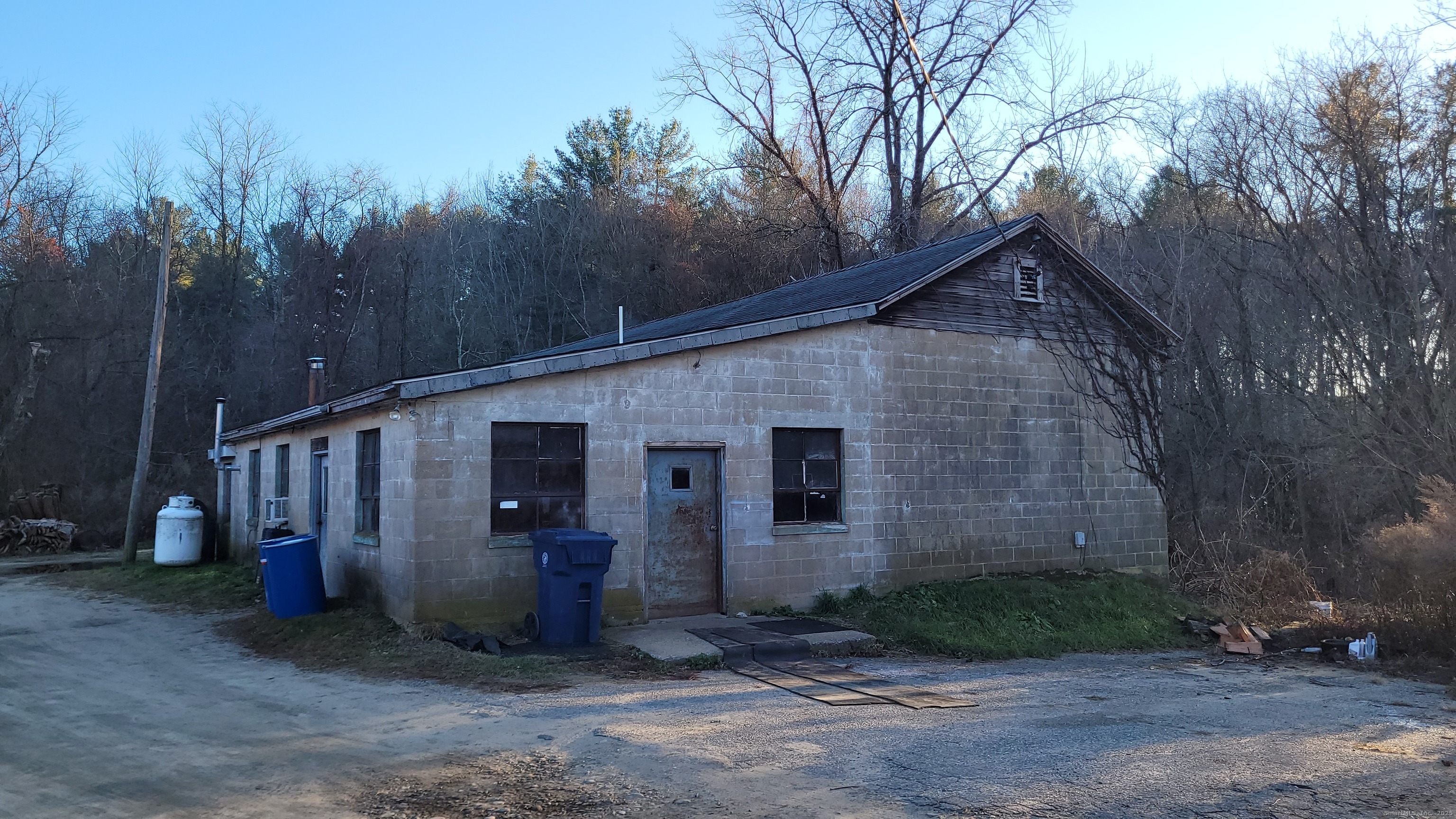 253 Brick Top Road Windham, CT 06280 - Photo 8 of 11 a view of a house with backyard and trees