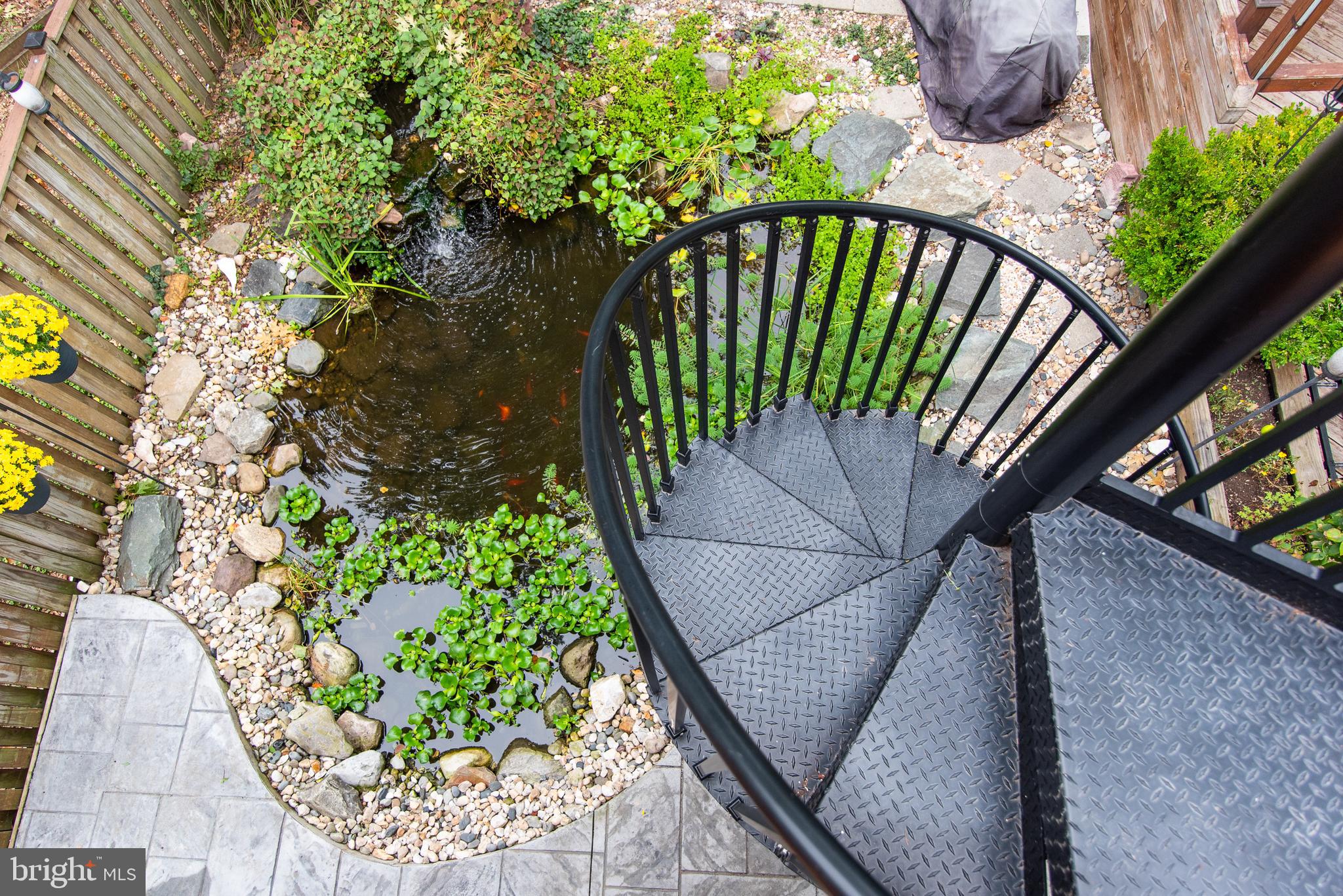 17 Running Court Baltimore, MD 21221 - Photo 23 of 34 Spiral staircase to access the patio