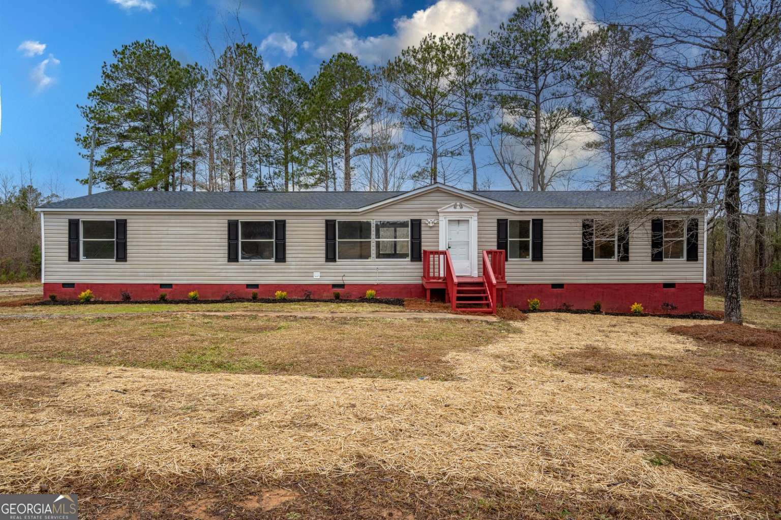 189 Chatfield Road Culloden, GA 31016 - Photo 1 of 1 a view of a house with a yard and large tree
