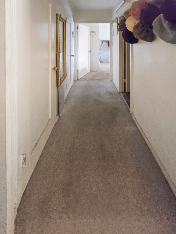 210 Clinton Avenue, Unit 4H Brooklyn, NY 11205 - Photo 5 of 7 a view of a hallway with closet and chandelier fan