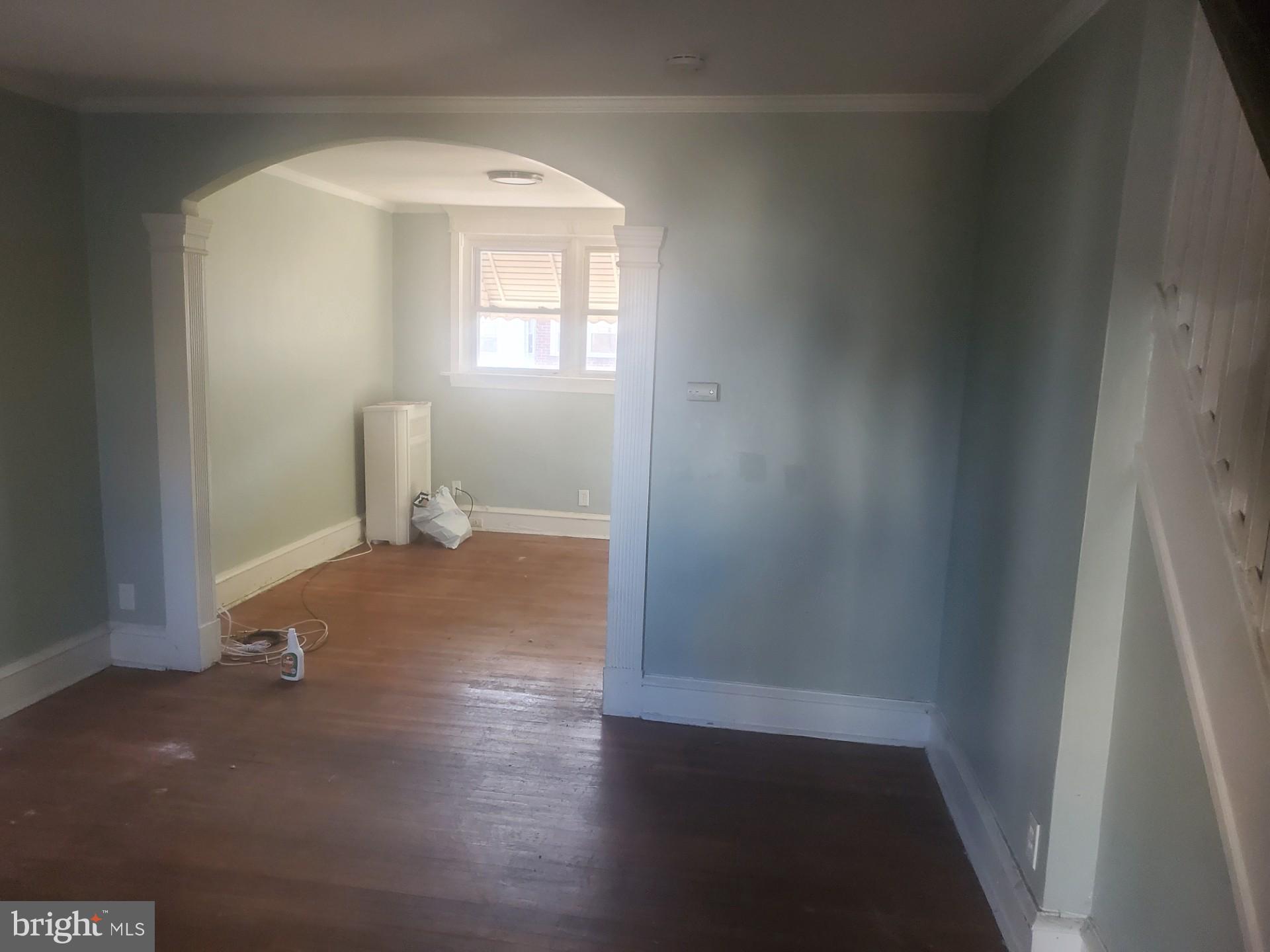 7018 Aberdeen Road Upper Darby, PA 19082 - Photo 3 of 8 a view of a room with wooden floor and a window