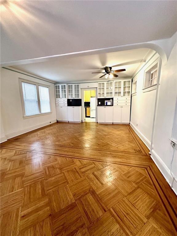 9111 Colonial Road Brooklyn, NY 11209 - Photo 4 of 15 a view of empty room with wooden floor