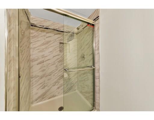 106 Fallston Street Springfield, MA 01119 - Photo 11 of 14 a bathroom with a shower and a sink